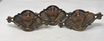 3 Antique Cast Iron Curtain Rod Ceterpieces. Price: $60.00.