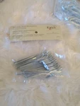New - Genuine Kirsch Slip Drapery Hooks Set Of 14. Price: $7.99.