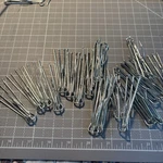 20PCS Stainless Steel Pinch Pleat Curtain Hooks, 4 Prongs Drapery For Wind Open. Price: $8.00.