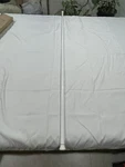 Amazon Basics Adjustable Tension Curtain Rod, 78-108" White, Classic Finials Used. Price: $14.00.