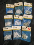 9 Vtg Pkgs Of Tg&y Curtain Accessories Nylon Carriers/pin-on Drapery Hooks Nib New. Price: $30.00.