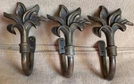 Set Of 3 Umbra Orchid Flowers Drapery Curtain Holder Tie Back Aged Brass Hooks Used. Price: $49.95.