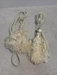 Hometrends 2 X Aristocrat Cream Curtain & Chair 31" 9" Tassel New. Price: $15.00.