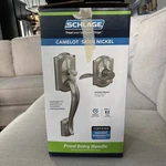 Schlage Camelot Entry Door Handle With Lever Satin Nickel FE285CAM619ACCCAM Open. Price: $59.99.