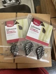 Better Homes Magnetic Curtain Holdbacks New. Price: $15.00.