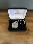 1995 Kennedy Half Dollar Key Ring (US#00086) Brand New Original Govt. Pack Ungraded. Price: $13.85.