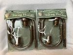 Two Pair (4) Large Swag Holders Christopher Howell Antique Copper New In Package. Price: $21.00.